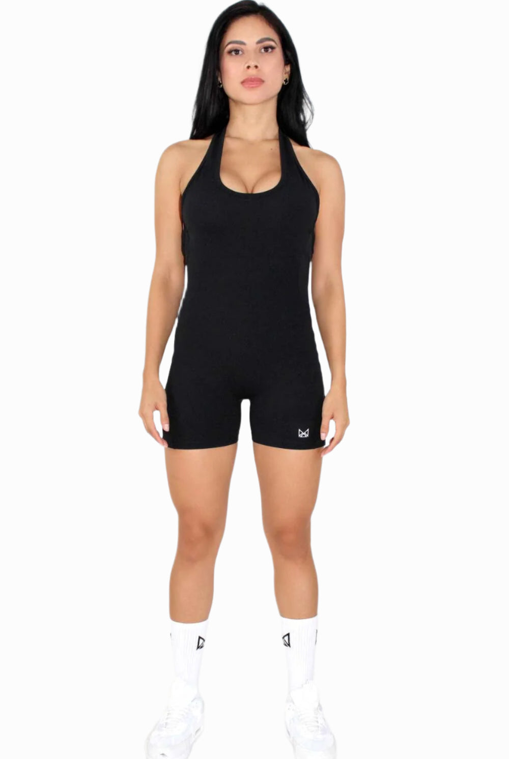 Women wearing a black MILA MVMT Sportswear One-Piece Gym Workout Romper - facing the front