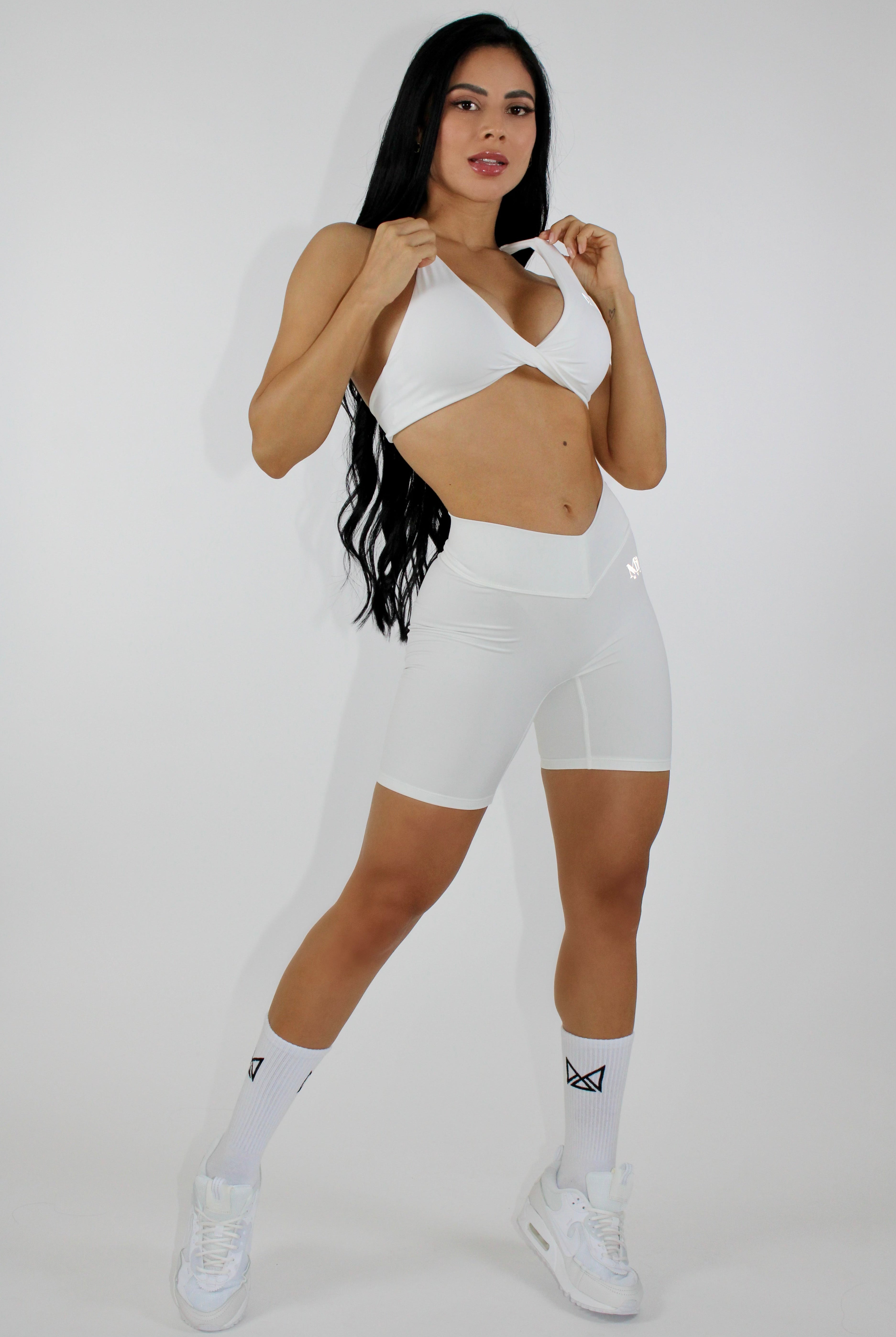 MILA MVMT Athletic Sportswear Aria Sports Bra & Buttery Soft Leggings & Shorts Gym Set in White Front View