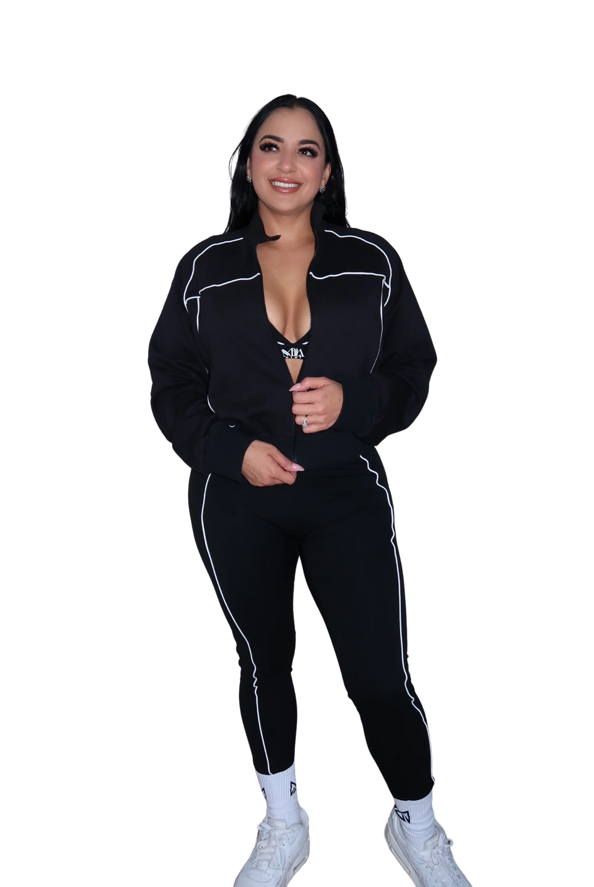Front view of woman wearing a full black hoodie