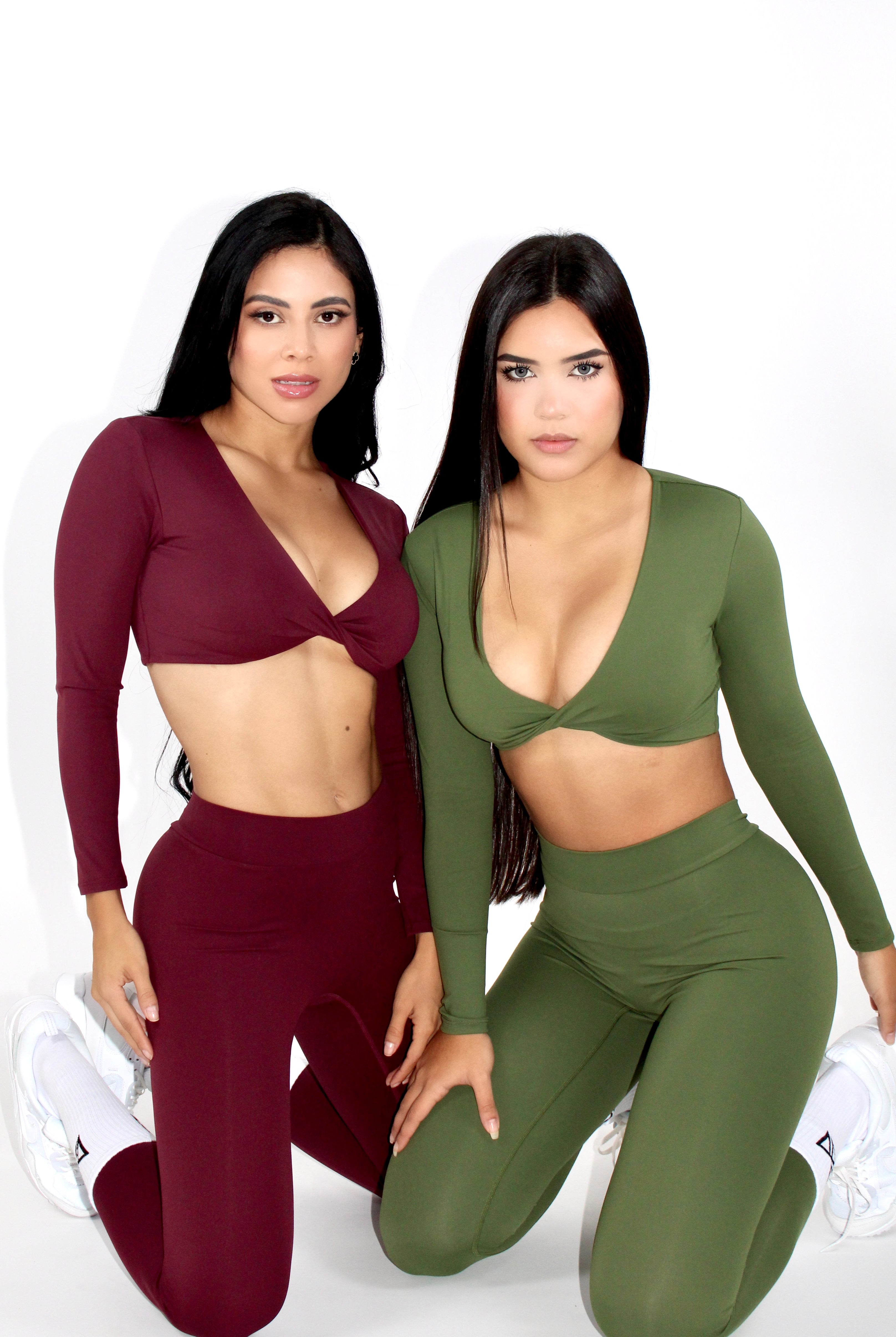 MILA MVMT Sportswear Gym Wear Workout Athleisure Crop Top Long Sleeve fern green and cranberry burgundy color facing front on knees