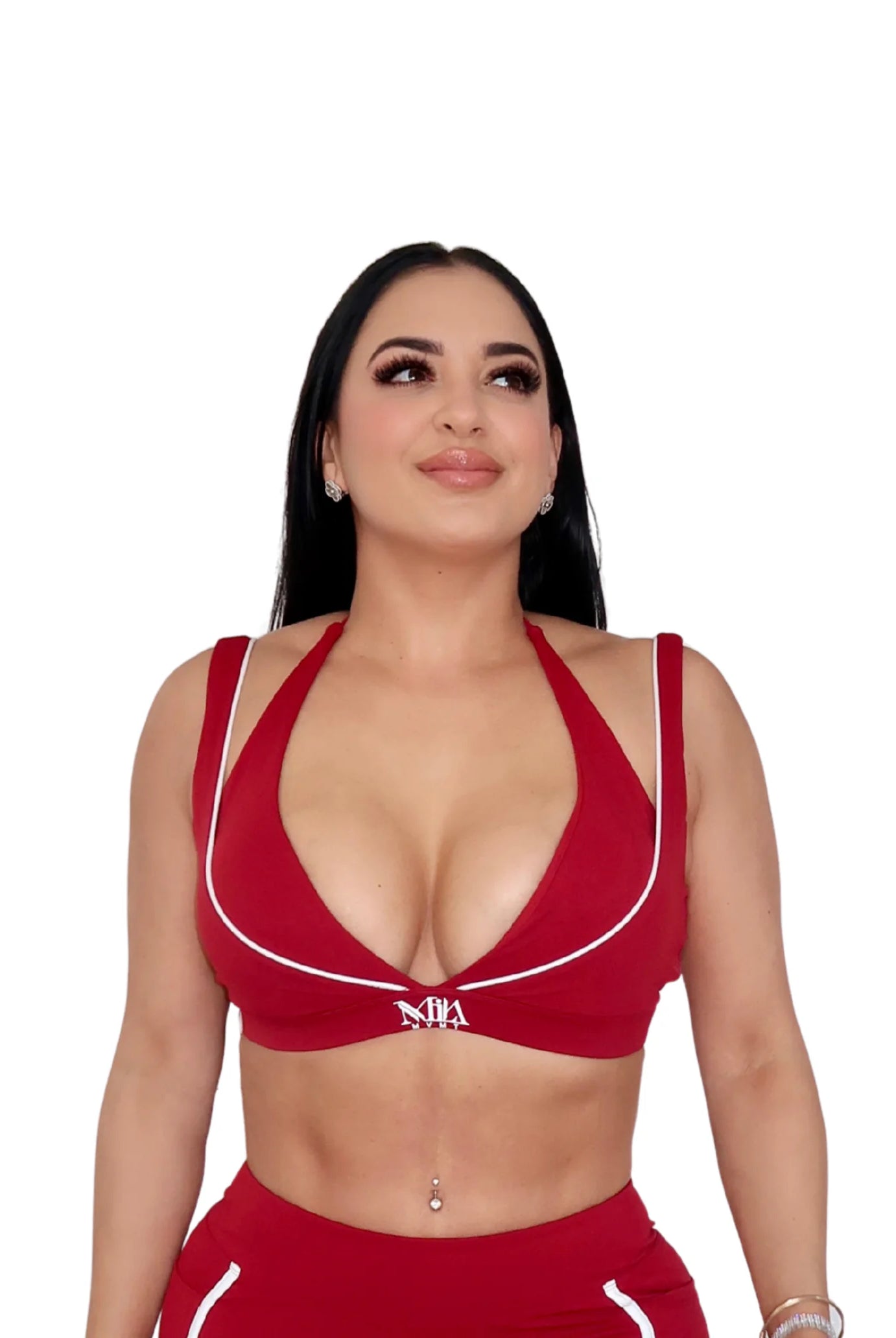 Woman wearing red activewear set for gym and pilates workout