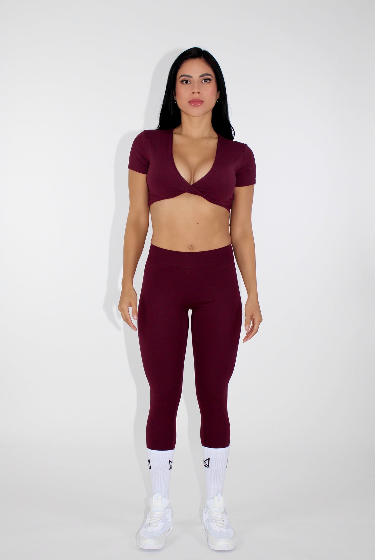 MILAMVMTSportswearGymYogaTennisGymTwistFrontCropTops front facing cranberry sportswear crop top