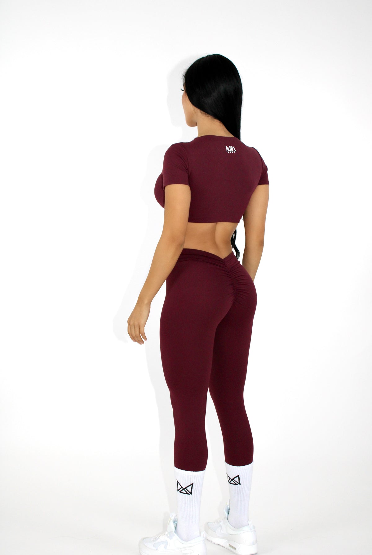 MILAMVMTSportswearGymYogaTennisGymTwistFrontCropTops front facing cranberry sportswear crop top back side