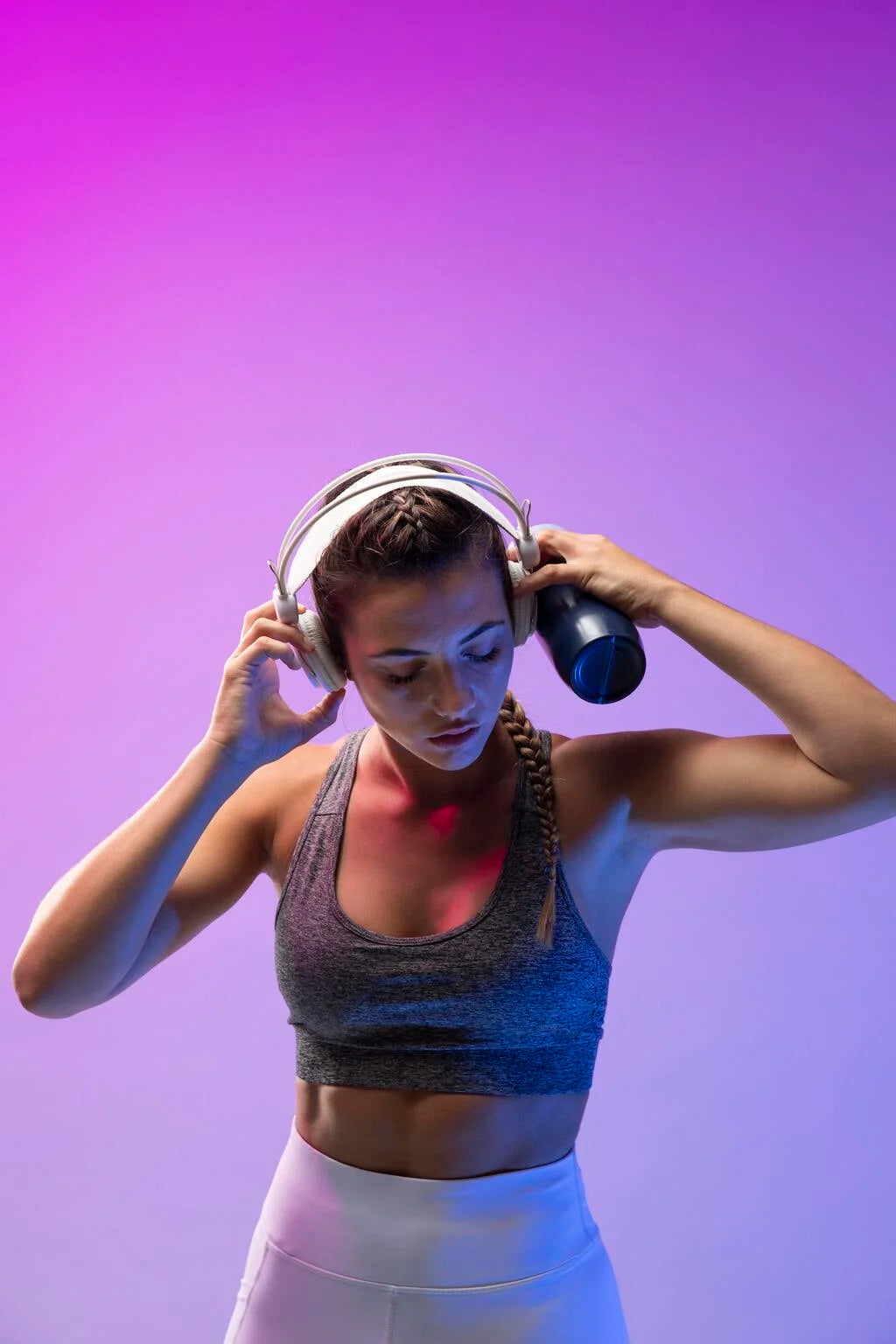 Woman exercising with her headphones