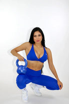Aria Crossover V-Waist Scrunch Leggings - Blue Sitting Down