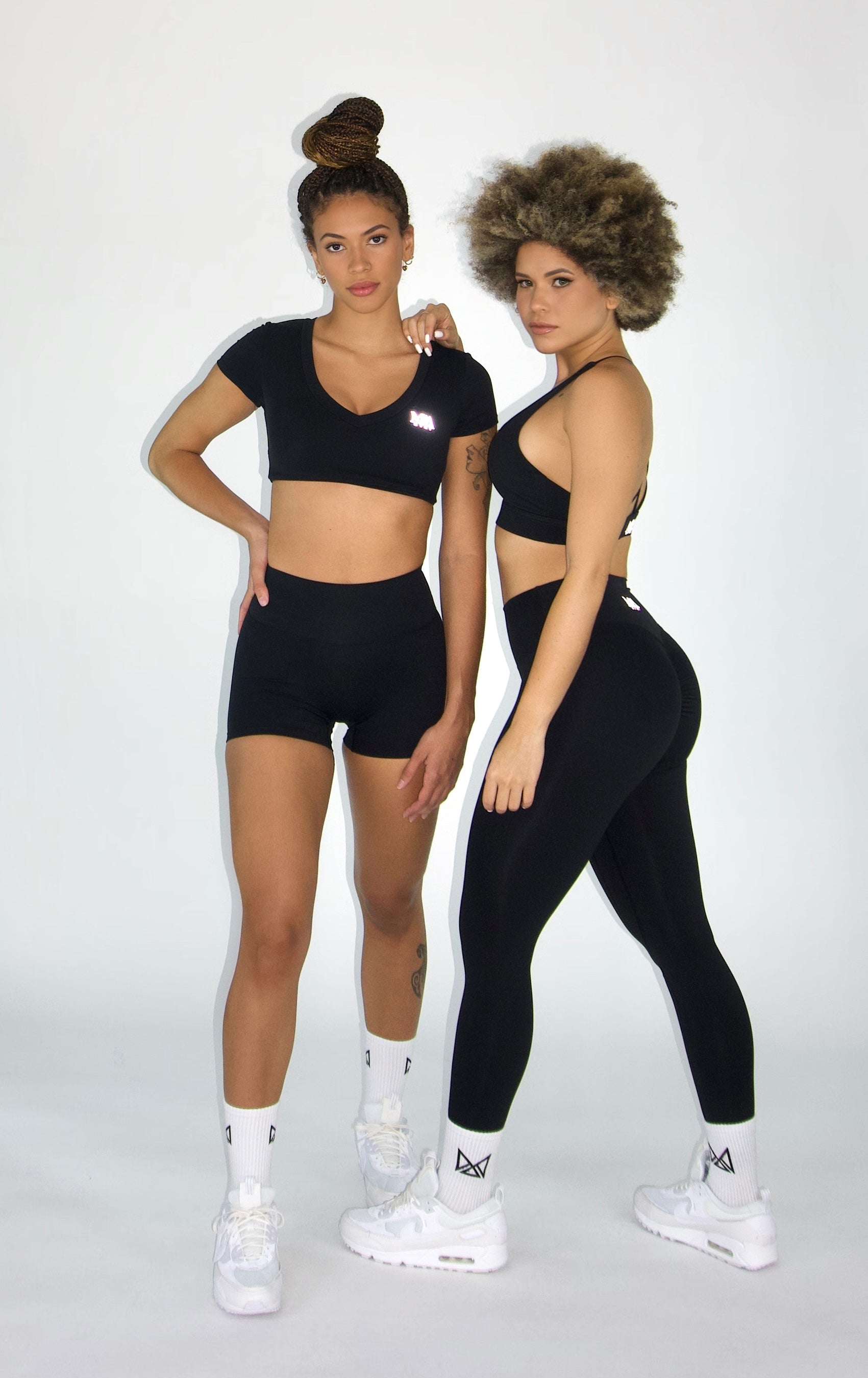 MILA MVMT Sportswear Emmie Short Sleeve Crop Top Sports Bra & Emmie Shorts Leggings Black Group