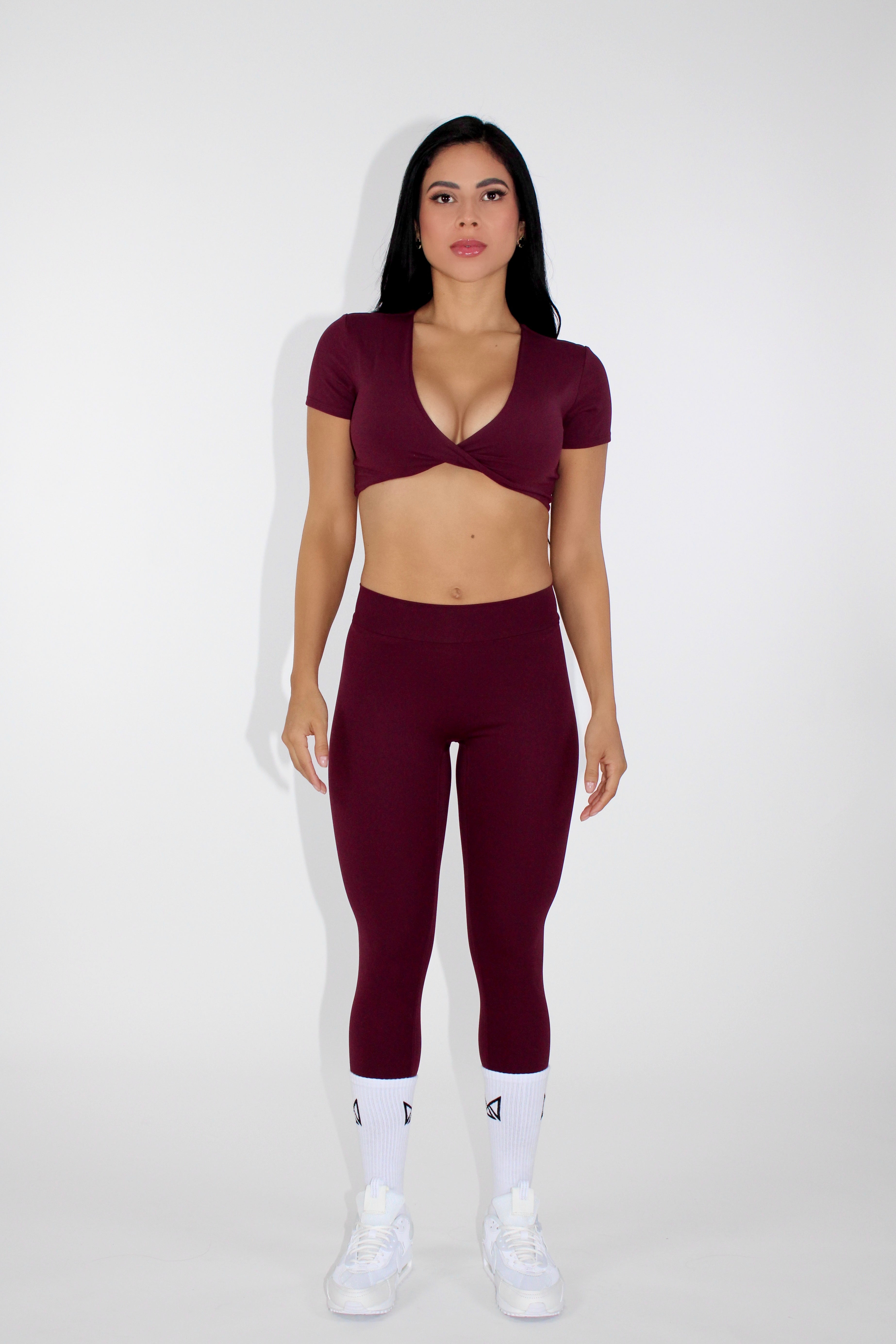 MILAMVMTSportswearGymYogaTennisGymTwistFrontCropTops front facing cranberry sportswear crop top