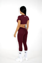 MILAMVMTSportswearGymYogaTennisGymTwistFrontCropTops front facing cranberry sportswear crop top back side