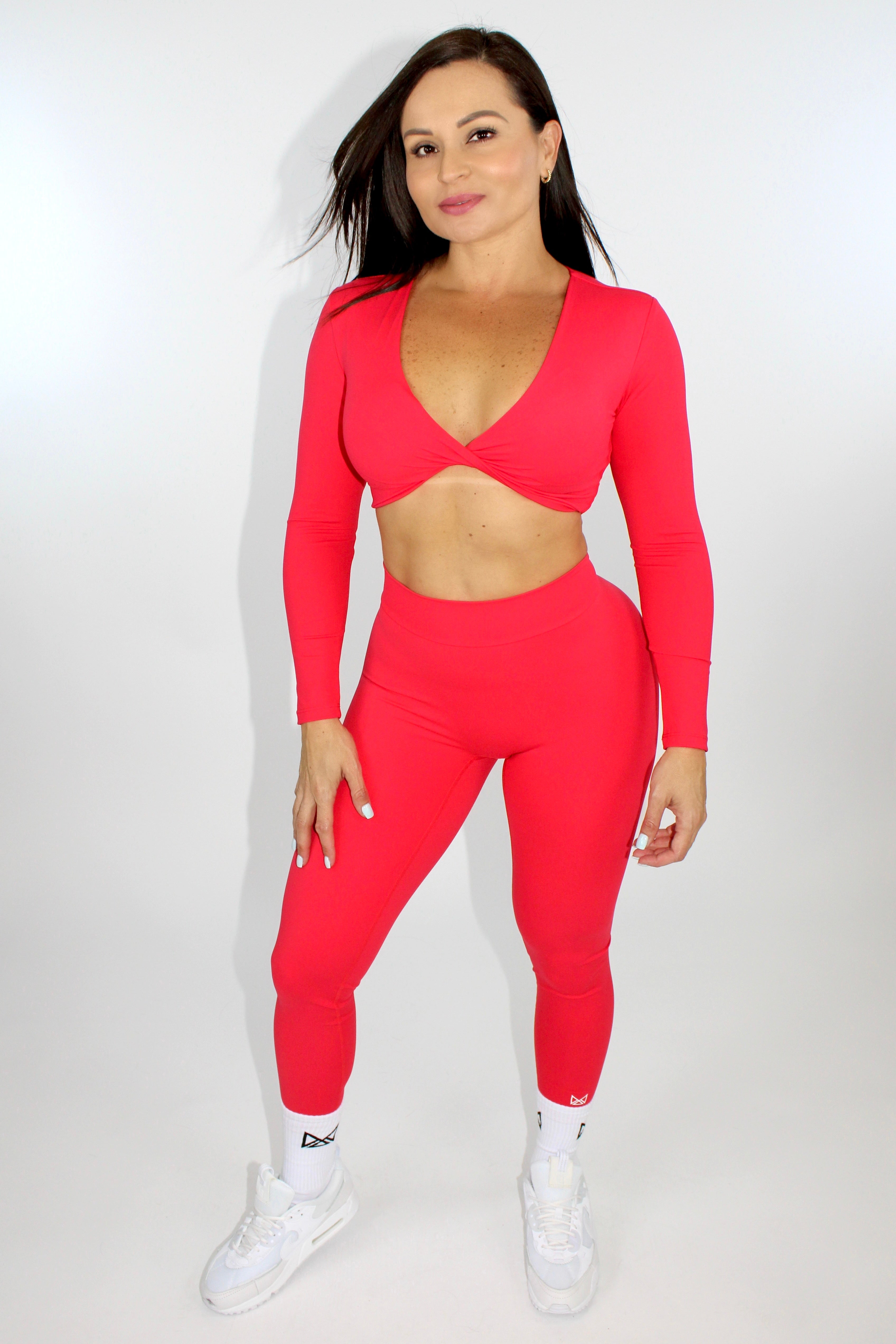 MILA MVMT Sportswear Long Sleeve Crop Top Gymwear Athleisure Sports Bra in Scarlet Red - model facing front