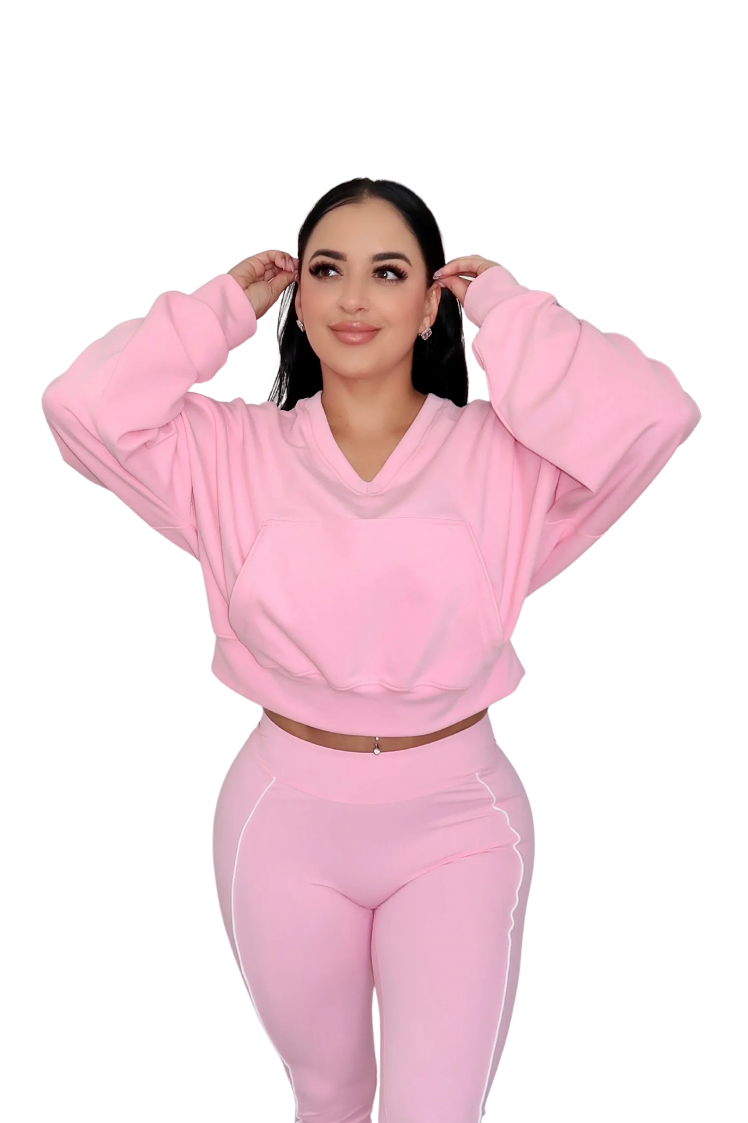 Woman in petal pink hoodie by MILA MVMT, medium front view