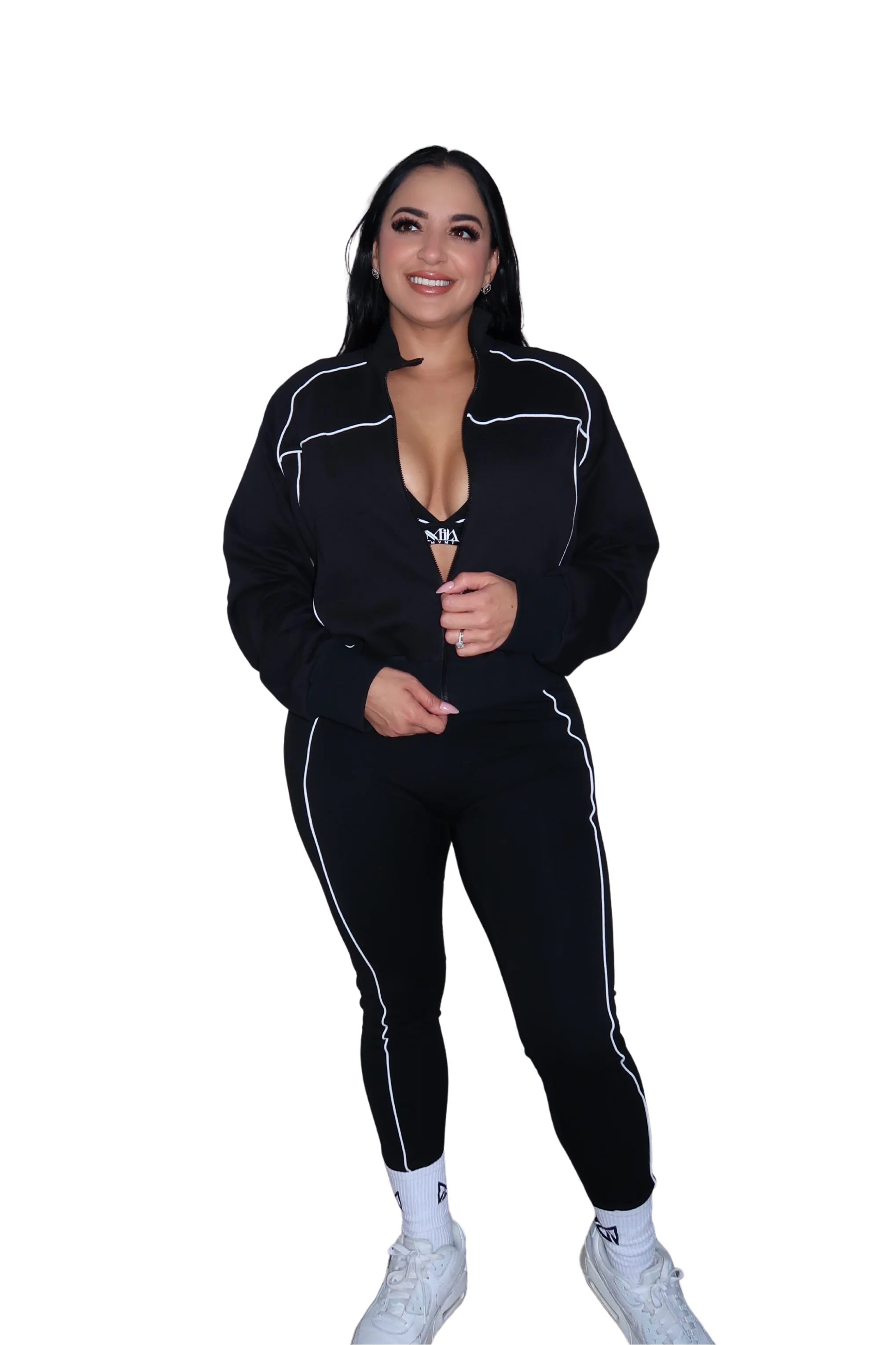Front view of woman wearing a full black hoodie